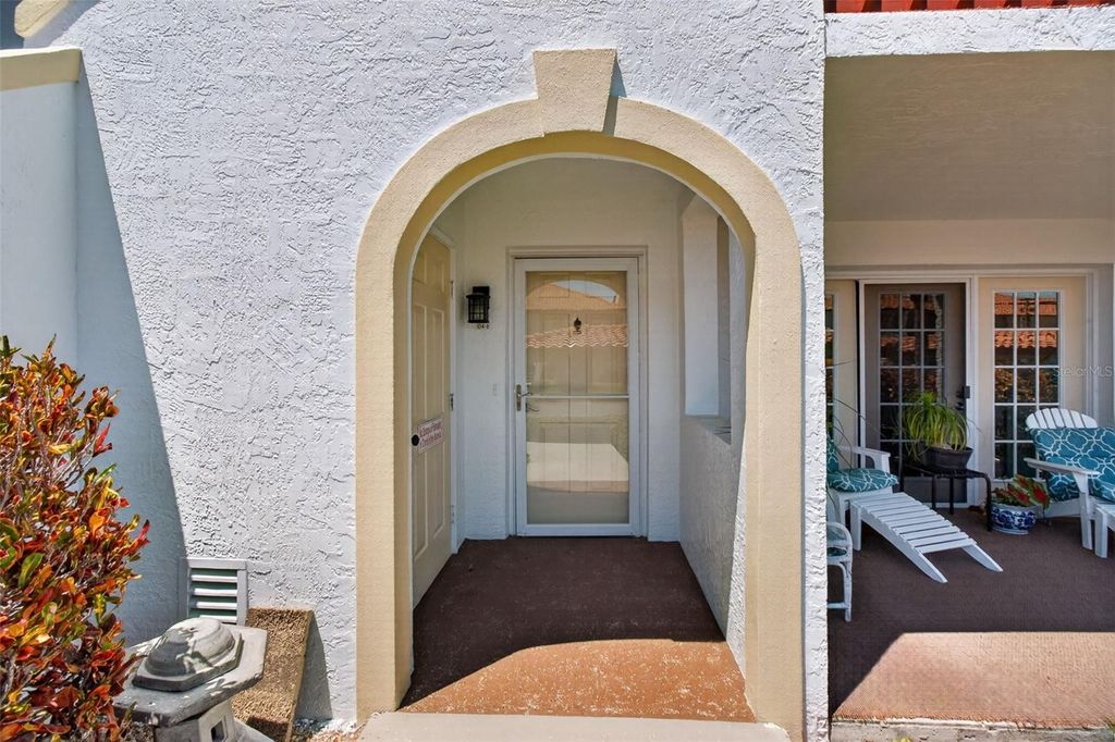 Photo of 10550 Village Drive #104, Seminole, FL 33772 (MLS # TB8502062)