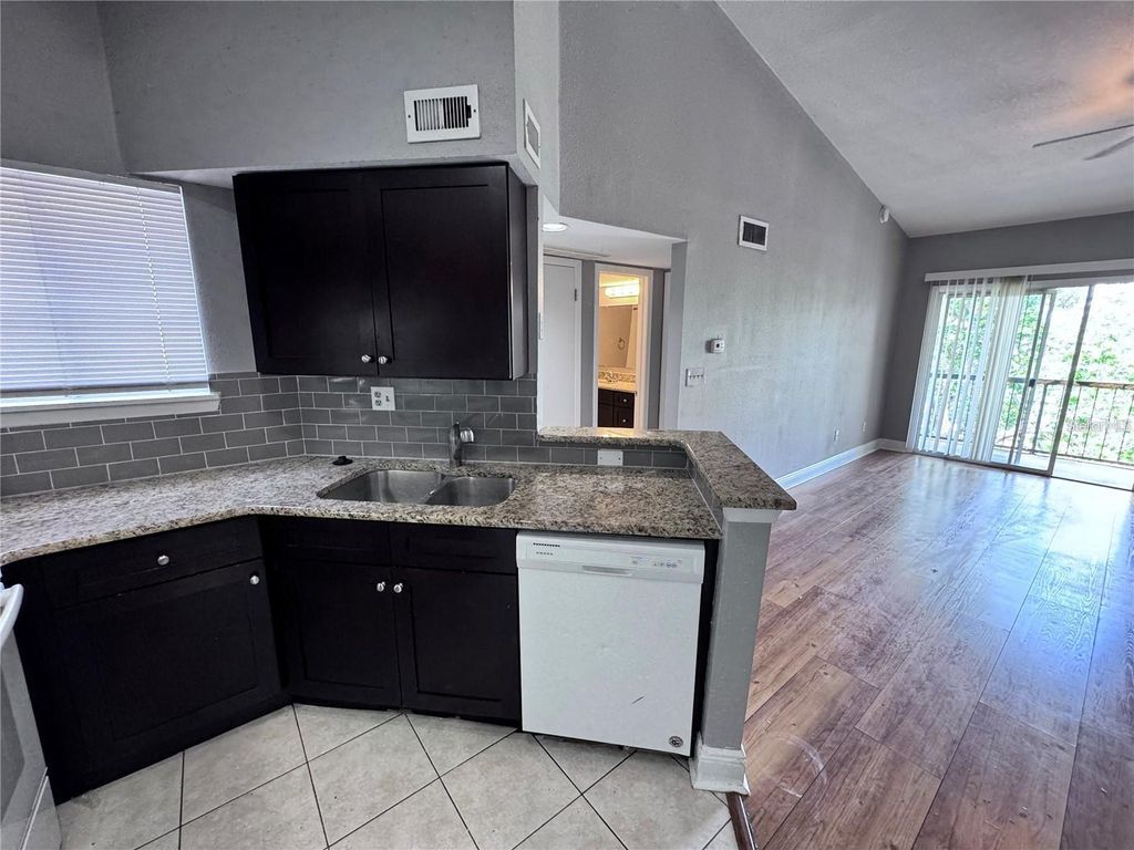 Photo of 1916 Lake Atriums Circle #33, Orlando, FL 32839 (MLS # O6382280)