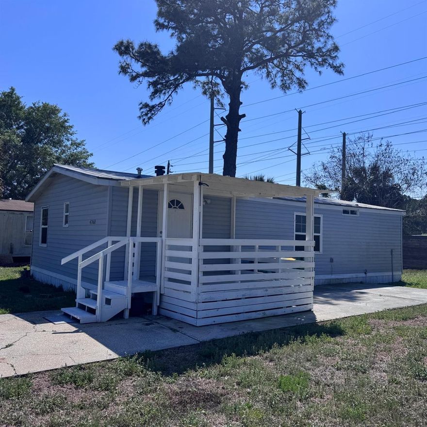 MANUFACTURED HOUSING - DOUBLE WIDE, **LAND is included** - Featuring 3 bedrooms and 2 full bathrooms, this home boasts a modern, fully equipped kitchen--including a washer and dryer--and sits on a beautiful, spacious private lot with no Homeowners Association (HOA) fees in Cocoa. It also includes an exterior storage area for additional space. The expansive grounds provide an ideal setting for gatherings, barbecues, and outdoor activities. This is an excellent choice for those seeking comfort, privacy, and a move-in-ready home located just minutes from the beaches of Cocoa and Cape Canaveral, in a quiet area surrounded by nature. Don't miss this opportunity to make it yours and enjoy the luxury of a spacious lot combined with the comfort of your own home! Ready for immediate move-in!