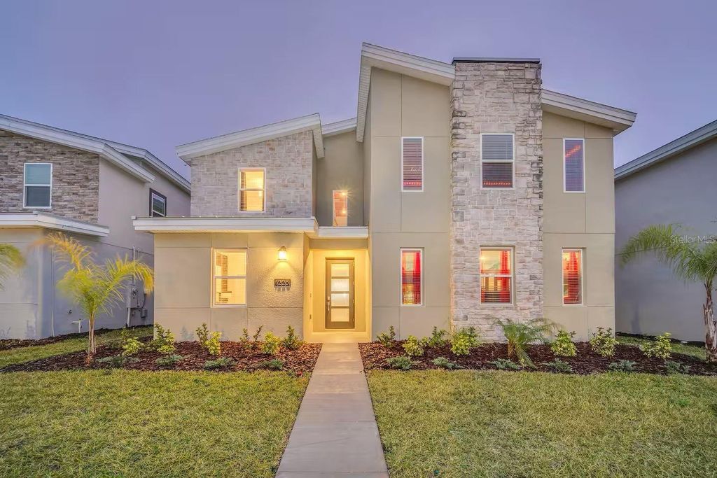 Photo of 1225 Challenge Drive, Davenport, FL 33896 (MLS # TB8486873)