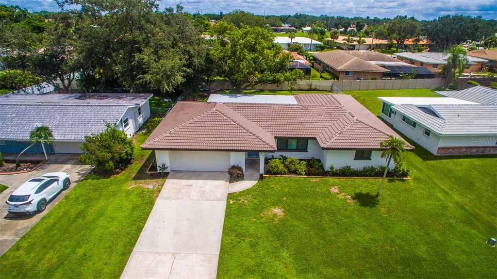 Photo of 3317 Pine Valley Drive, Sarasota, FL 34239 (MLS # A4663718)