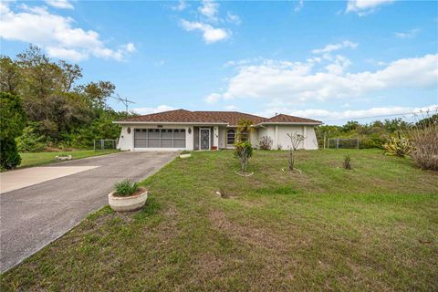 Photo of 1987 Ponce De Leon Boulevard, North Port, FL 34291 (MLS # N6143513)