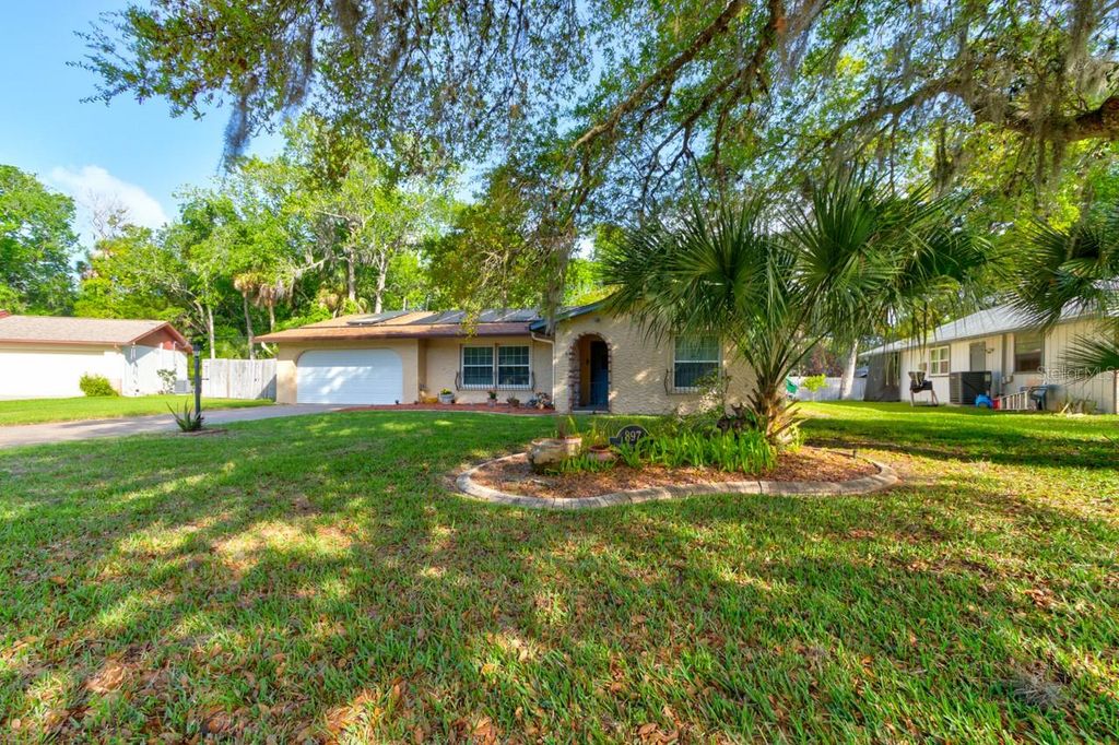 Photo of 897 Lindenwood Circle N, Ormond Beach, FL 32174 (MLS # FC317330)