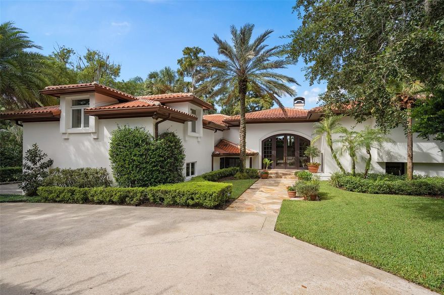 An extraordinary opportunity on the shores of Lake Osceola on one of Winter Park's most charming streets. This architecturally interesting lakefront estate offers breathtaking panoramic sunset views and an irreplaceable setting. Thoughtfully designed with the beautiful finishes. First time available in over three decades, this is rare chance to own a legacy property!