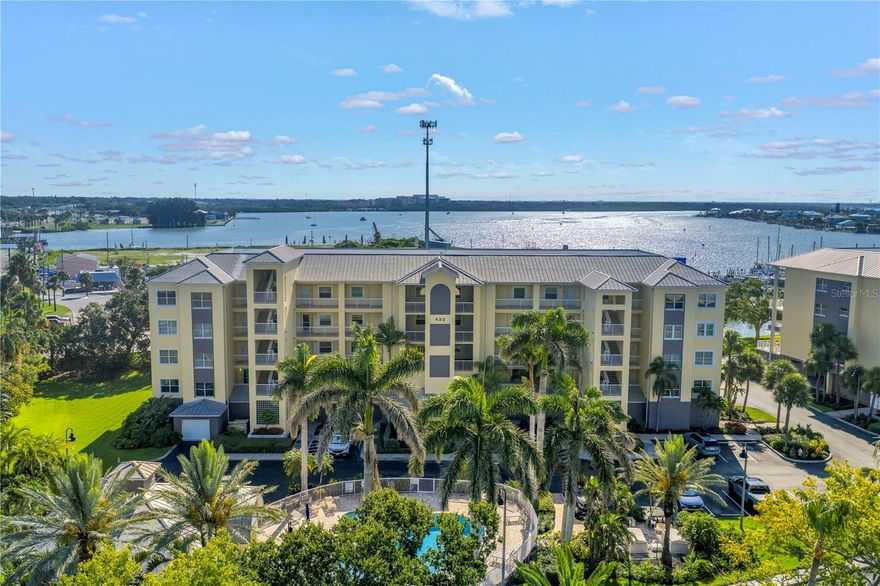 Waterfront Corner Condo with Sweeping Views and Private Garage. Welcome to Snug Harbour, where coastal elegance meets everyday comfort. This beautifully appointed fifth-floor end unit offers over 1,847 square feet of light-filled living space, three spacious bedrooms, and two full baths designed to feel more like a home than a condo. From every bedroom and the living room, enjoy stunning views of the Intracoastal Waterway thanks to the corner-unit layout and abundant windows. Step out onto your expansive balcony the perfect spot to relax or entertain while taking in the peaceful waterfront scenery. Inside, the split-bedroom floor plan features a welcoming foyer with custom niches, soaring 9-foot ceilings, recessed lighting, and tile flooring throughout. The grand primary suite opens to the balcony and includes dual walk-in closets and a spa-like en-suite bath with double vanities, updated cabinetry, a soaking tub, oversized walk-in shower, and private water closet. The kitchen offers warm wood cabinetry, Corian countertops, a breakfast bar, and a formal dining area. You’ll also enjoy the convenience of a private indoor laundry room, ceiling fans throughout, a pantry, six-panel doors, a newer A/C compressor, and a newer water heater. This secure-access building includes elevator and stair access, along with a private 1-car garage located on the ground level.  Snug Harbour offers over 600 feet of waterfront. Community amenities include a heated pool and spa, clubhouse, sun deck, car wash station, and boat docks with slips available exclusively for residents. Most dogs up to 75 lbs. are welcome. Ideally located minutes from the beach, parks, top-rated schools, restaurants, shopping, boat ramps, hospitals, and vibrant John’s Pass—this is your opportunity to embrace the best of Florida’s coastal lifestyle.