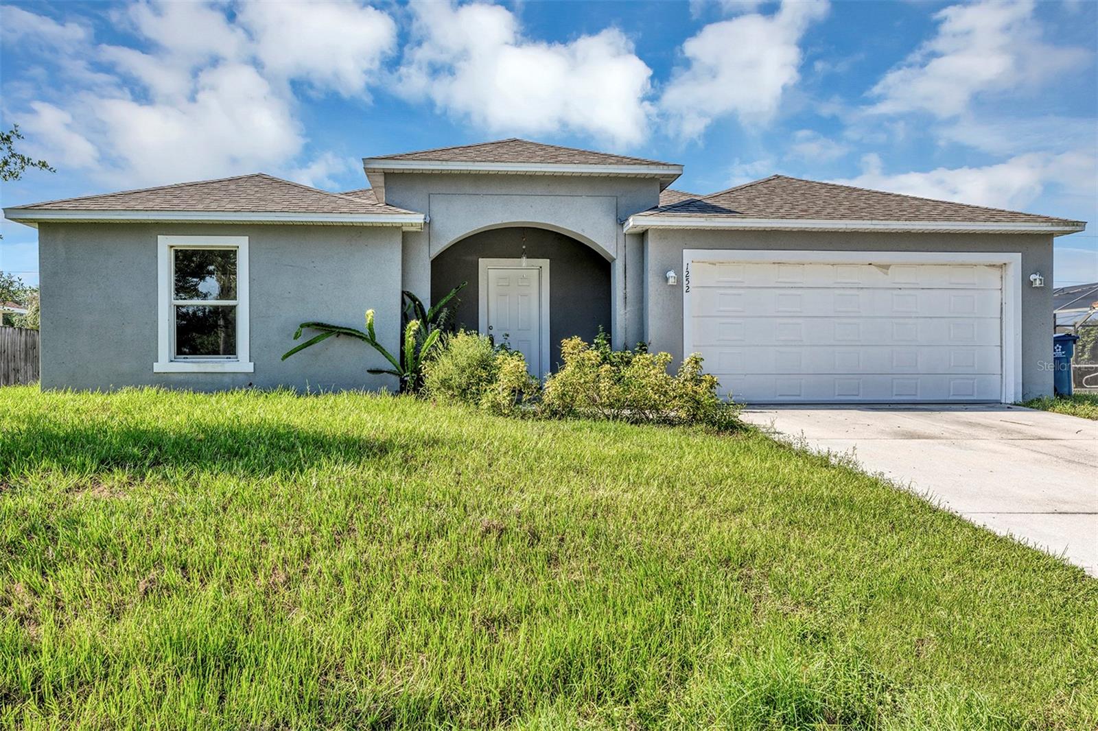Step through the front door of 1252 Giralda St, Palm Bay, and you’ll be immersed in refined elegance and modern luxury,a newly constructed residence that blends contemporary elegance with everyday comfort. This home greets you with an open, sunlit floor plan and thoughtfully designed finishes throughout.
The heart of the home is a chef-ready kitchen—featuring gleaming stainless steel appliances—including a modern refrigerator, oven with smooth cooktop, built-in microwave, and dishwasher—all set against expansive countertops.The bedrooms are generously sized, offering plenty of natural light and versatile layouts to suit any lifestyle.The primary bedroom is spacious and inviting, designed to capture natural light through large windows and offering a generous walk-in closet for easy organization. Its attached bathroom brings a touch of modern luxury, featuring a sleek dual-sink vanity, polished countertops, contemporary fixtures, and a walk-in shower that creates a refreshing, spa-like feel.
The additional bedrooms provide comfort and versatility, each with ample space and bright, airy layouts ideal for family, guests, or a home office. The secondary bathroom continues the elegant design, with a stylish vanity, quality finishes, and a convenient shower-tub combination to suit everyday needs.
Outside, the spacious yard is a true highlight, giving kids room to play, pets space to run, and families a private spot to enjoy the outdoors together.The attached garage offers secure parking and extra storage for added practicality.
To make your move even easier, we are proud to offer Obligo coverage for renters, providing flexible move-in options.
Please note there is also a $25 monthly septic tank fee.