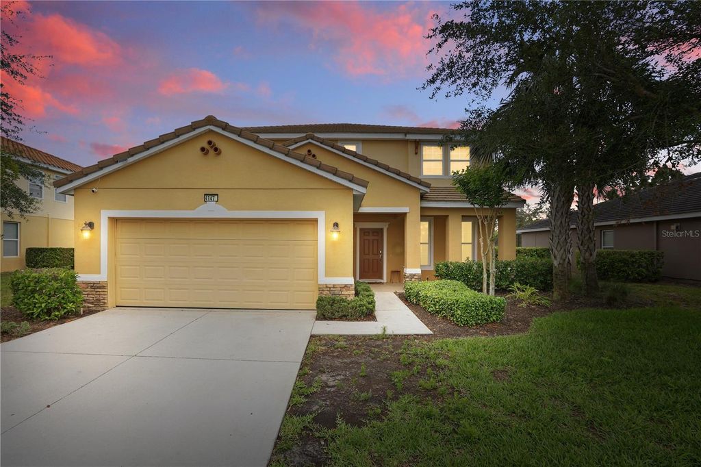 Photo of 4147 Oaktree Drive, Davenport, FL 33837 (MLS # OM723980)