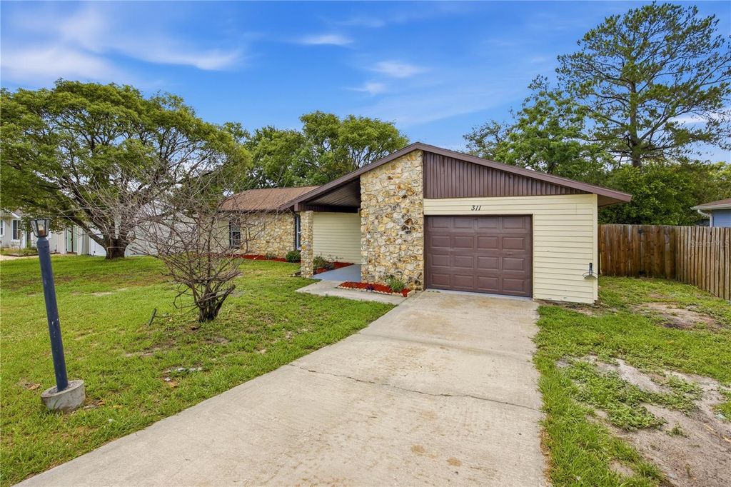 Photo of 311 Marion Oaks Drive, Ocala, FL 34473 (MLS # OM725413)