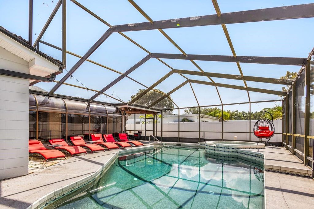 Photo of 12110 93rd Way, Largo, FL 33773 (MLS # TB8468871)