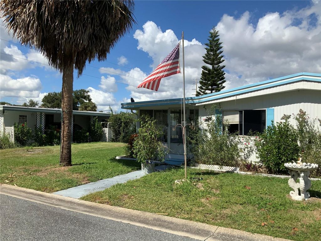 Photo of 111 Aha Way, Leesburg, FL 34788 (MLS # G5103439)