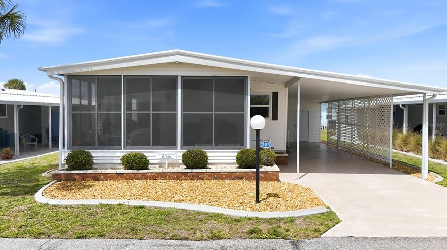 Absolutely beautiful Classic Coastal Cottage best describes this immaculately maintained and UPGRADED home with a long WATER VIEW of Cayman Lake! FURNISHED so you can immediately enjoy the lifestyle in this dream retreat in a vibrant 55+ "Resident Owned" community with WATER ACCESS to the MYAKKA RIVER! Extra large primary bedroom includes an "office" built in with desk, pull out storage drawers and cabinetry. The ensuite bath was stunningly remodeled with beautiful porcelain tile flooring, a walk in shower, porcelain surround, dual vanities and completing the suite a huge walk in custom closet. A comfortable guest bedroom and well-appointed guest bath provide plenty of space for visitors. The Kitchen boasts a granite topped LARGE ISLAND, plenty of granite counters, corner windows over the oversized corner sink, stainless steel refrigerator, new Bosch dishwasher and white shaker cabinets with pull out shelves. Adjacent dining room and living room flow seamlessly into the Florida room with floor to ceiling, three sided glass enclosed windows for your relaxing view of the lake and wildlife. Mannington heavy duty vinyl luxury plank flooring and faux wood blinds throughout. Oversized 2.5 car/golf cart tandem carport with privacy lattice work. Storage/utility shed includes washer and dryer, two windows and small clothesline built in. Light and bright home in a peaceful and private location close to the gym and clubhouse. Enjoy peace of mind with these updates/upgrades including ROOF 2023, new wind resistant dbl pane vinyl clad windows, all new luxury laminate flooring, kitchen reimagined, remodeled primary bath, water heater, electric panel, AC 2024, home was re-piped AND, most importantly, vapor barrier plus tie-downs inspected and restored. Low-maintenance landscaping features rock beds, curbing, and underground gutters. Lazy River Village offers an amenity-rich lifestyle, including tennis courts/pickelball, a heated pool, fitness center, shuffleboard, social activities like bike clubs, card clubs, 2 craft rooms, billiards room, bocce, pitching/putting green and driving net, horseshoes, pontoon boating and marina, a catch-and-release fishing lake, not to mention on-site storage for your canoe/kayak. Mowing, cable and internet are included! 30 minutes to City of Venice with weekend festivals, farmer's market, biking trails and beautiful area beaches, golf, Warm Mineral Springs, and two major league baseball training fields; Braves and Tampa Bay Rays. Punta Gorda airport is a 35 minute drive, Sarasota airport 45 minutes andFt Myers Intl about an hour’s drive with easy I75 access. Completely FURNISHED with QUALITY FURNITURE and everything you need. Ideal for full-time living or a seasonal retreat!