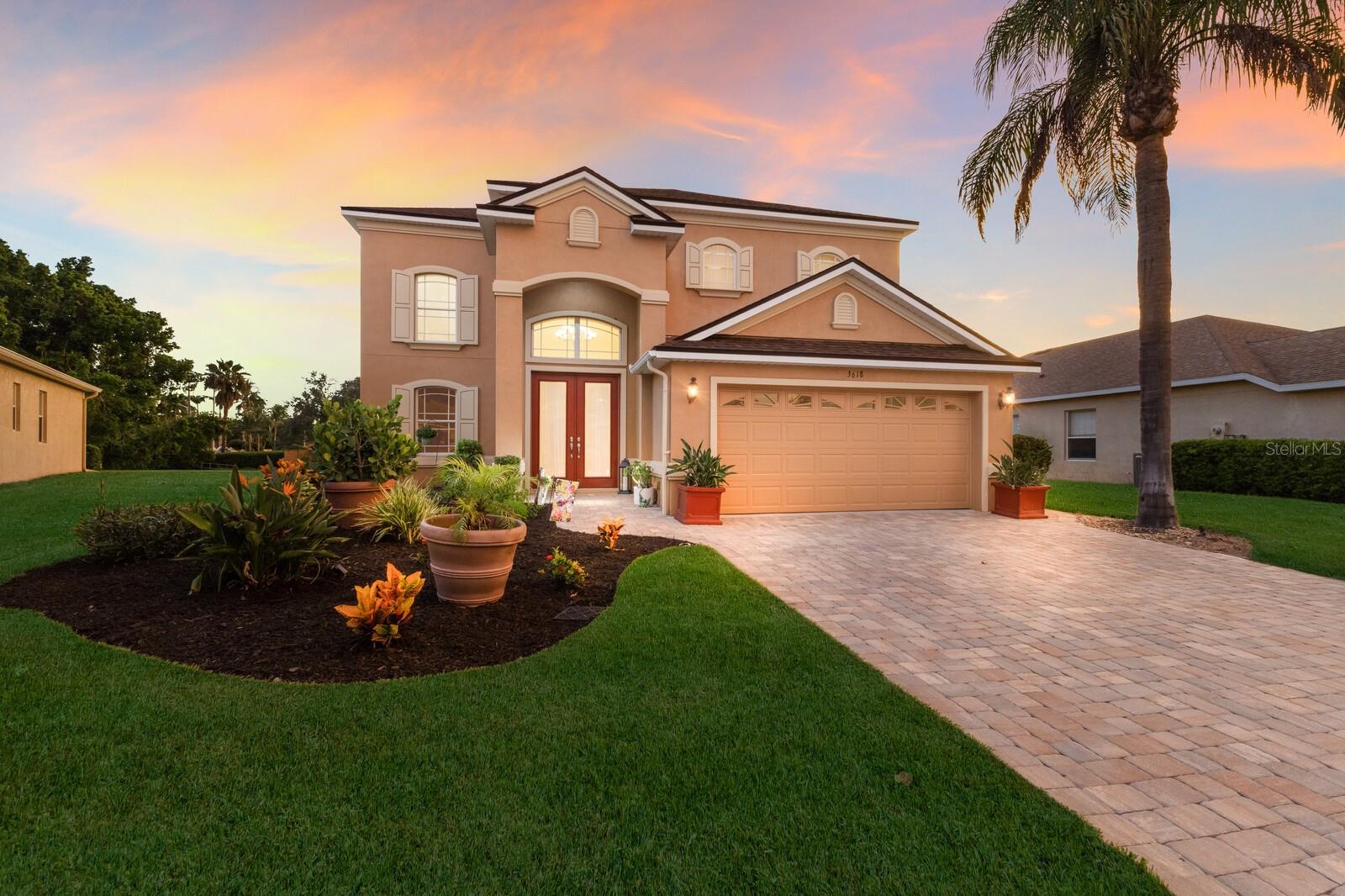Welcome to Palma Sola Trace, a sought-after coastal community in Bradenton where resort-style amenities and an unbeatable location set the stage for the Florida lifestyle you have been dreaming of. Set on nearly a quarter-acre lot, this impressive two-story, five-bedroom pool home spans over 3,000 square feet and has been meticulously maintained and updated over the years. A pavered driveway and walkway lead you to the grand two-story entry, where wall-to-wall tile flooring welcomes you into the open-concept living space. The living room features a striking tray ceiling and a brand-new ceiling fan, while the updated kitchen boasts brand-new appliances, granite countertops, and a timeless subway tile backsplash. Enjoy both an eat-in kitchen and a formal dining area, offering plenty of room for entertaining.
The expansive first-floor owner’s suite showcases hardwood floors, a tray ceiling, dual walk-in closets, and a spa-like ensuite with dual vanities, a glass-enclosed walk-in shower, a garden tub, and a private water closet. Just off the living room, double doors open to a second bedroom with a closet that is currently used as an office, making it ideal for guests or multi-generational living. A convenient half bath is perfect for visitors. Upstairs, three additional bedrooms each feature brand-new ceiling fans and share a well-appointed full bath.
Step through the sliding glass doors to your private outdoor oasis. The pavered, screened-in lanai features a brand-new screen enclosure and overlooks an oversized heated saltwater pool with spa. Whether hosting friends or enjoying quiet evenings, this backyard is designed for relaxation. Recent major upgrades include a brand-new roof, two new AC systems for upstairs and downstairs with interior and exterior units, each with a 10-year transferable warranty, and a whole-house reverse osmosis system. Best of all, the home is in a no-flood zone, so flood insurance is not required.
Palma Sola Trace offers a maintenance-free lifestyle with a resort-style pool, fitness center, playground, and a clubhouse for gatherings. This community’s prime west Bradenton location puts you just minutes from world-famous beaches such as Anna Maria Island, Holmes Beach, Bradenton Beach, Coquina Beach, and Longboat Key. Spend your days exploring Robinson Preserve, Perico Bay, and De Soto Preserve with scenic trails for hiking and biking, or enjoy kayaking and birdwatching surrounded by Florida’s natural beauty. The community is also close to vibrant downtown Bradenton with its riverwalk, shops, dining, and cultural attractions, as well as Sarasota’s arts and theater district. Golf enthusiasts will appreciate the many nearby courses, while sports fans will love the proximity to the world-renowned IMG Academy and LECOM Park for spring training baseball. The Sarasota Bradenton International Airport is conveniently located just 15 minutes away, making travel a breeze. This home offers more than just a place to live, it delivers a lifestyle filled with convenience, recreation, and coastal charm. Schedule your showing today!