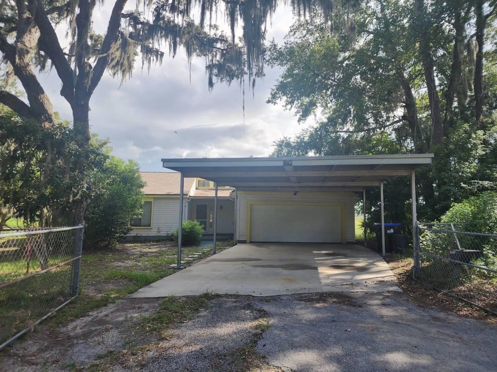 Photo of 6520 Lynn Road, Orlando, FL 32810 (MLS # O6432851)