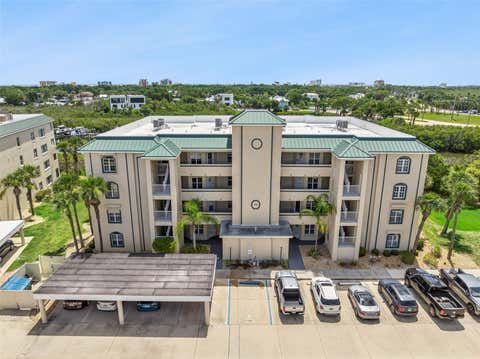 Photo of 426 Bouchelle Drive #101, New Smyrna Beach, FL 32169 (MLS # O6414969)