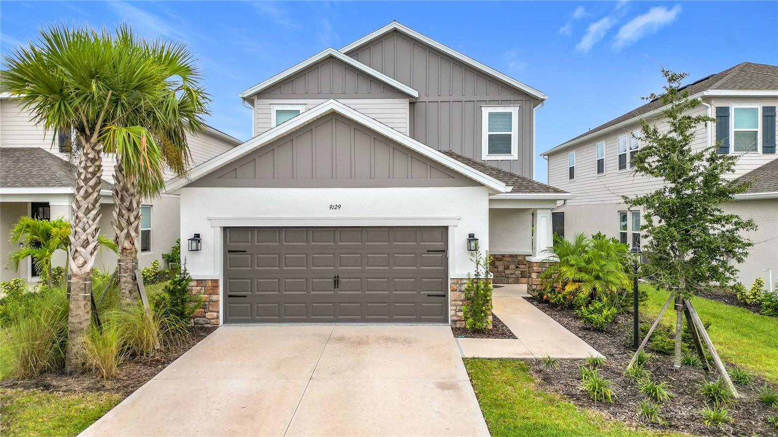 Priced to sell, better than new, exterior stone decoration, rain gutter, interior many upgrades, definitely not your standard builder inventory home! Built in 2024, this house is within the gates of extremely popular SKYE RANCH; two-story, luxury designed & expanded Anastasia Great Room plan offers FOUR Bedrooms (two master suites; one on first level, one on second), PLUS Office, PLUS Huge Game Room, PLUS Loft. This versatile home is perfect for year-round, those in need of a multi-generation home, or for a seasonal buyer who needs plenty of room when family & friends visit! The first floor Master Bedroom suite includes a walk-in closet, separate shower and dual master vanities. The second floor master suite has TWO walk-in closets, dual vanities and another separate shower. The bonus room is HUGE and can double as a play room, game room, private work-out room and more. The Loft area can also double as a reading retreat, a second study/office, art studio, musician’s corner, etc. Both builder and post-closing upgrades include; Superbly appointed GOURMET Gas Café Advantage kitchen package, granite countertops, 42” upper cabinetry with 12 inches handlers, roll-out base cabinets & stainless appliances, 8 ft. doors & high baseboards, Divided double French doors in Study/Office, sliding glass doors to patio, shower enclosures, first floor tile through out, fans in every room. SKYE RANCH Offers all-inclusive amenities such as a Gated Entrance, “The Hub” Community Center, multiple Swimming Pools, Spa, Fire Pit, BBQ area, Playground, Rock Climbing Wall, Espresso Bar, Basketball Gym, Fitness Center, Aerobic/Dance studio, Club Game/Party Rooms, Entertainment Kitchen, Tennis Courts along with a Community Activities Director to coordinate social events; This master planned community also offers three Community Dog Parks, Bike & Walking Trails, Volley Ball, and access to Soccer & Baseball fields. Just outside the Community, a brand new K-8 school just openned! A terrific OPPORTUNITY to own in this highly desirable, family friendly, pet friendly community with only one HOA fee, 25 miles trail inside community. This home has 'THE BEST ORIENTATION' for relaxation, or patio & backyard party entertaining. Come see this beautiful NEW HOME on a private lot. Enjoy the short commute to Siesta Key Beach which is number one in US, and so close to all of Sarasota's finest attractions; Beaches, Boating, Arts & Entertainment, Fine Dining, Museums, Aquarium and Theaters, Legacy Trail & Oscar Scherer State Park.