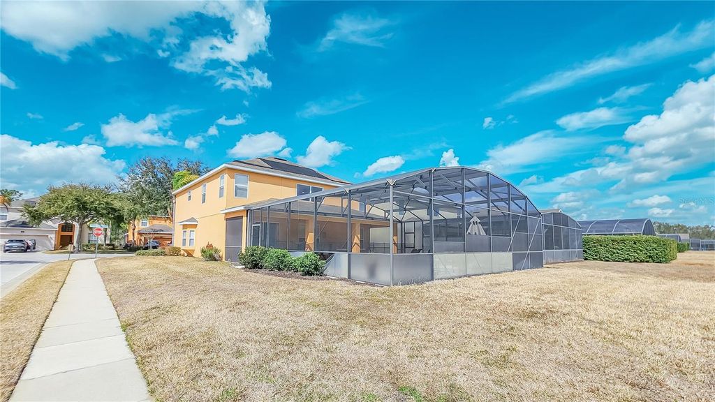 Photo of 1009 Orange Cosmos Boulevard, Davenport, FL 33837 (MLS # O6376655)