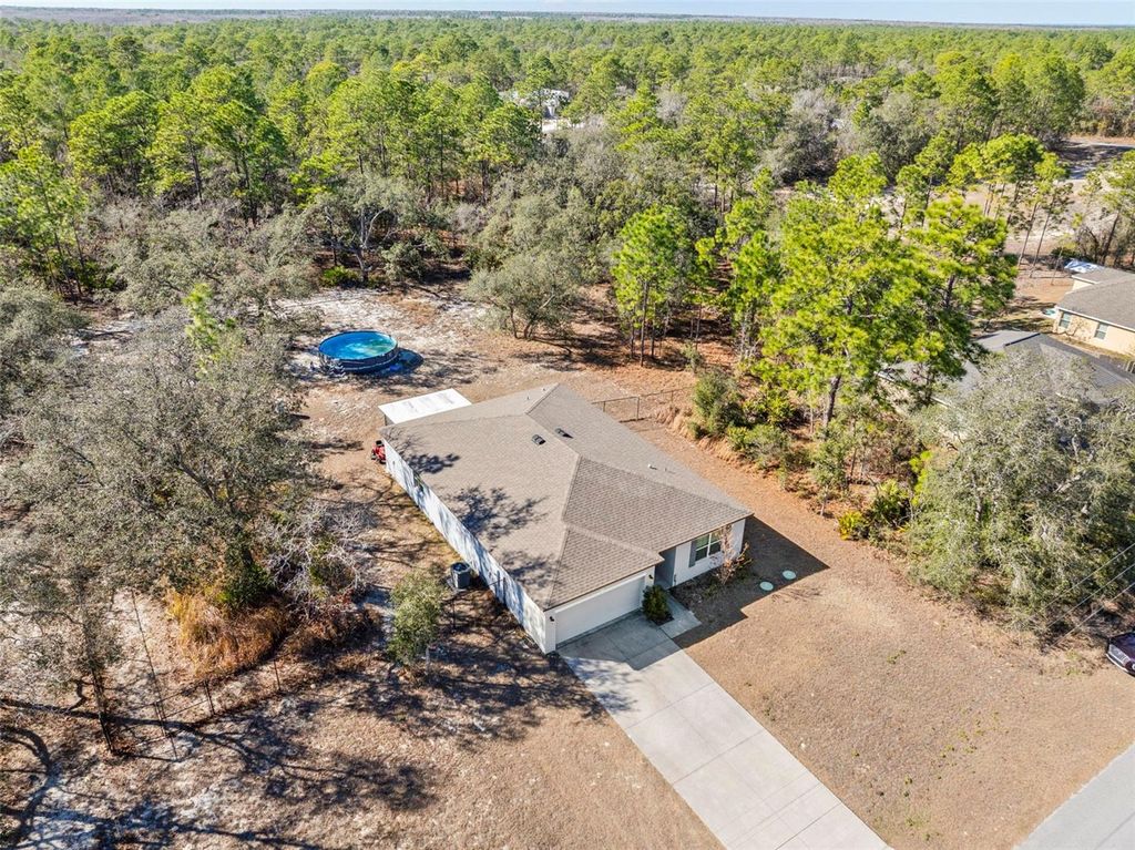 Photo of 15439 Mount Sparrow Road, Weeki Wachee, FL 34614 (MLS # TB8473236)