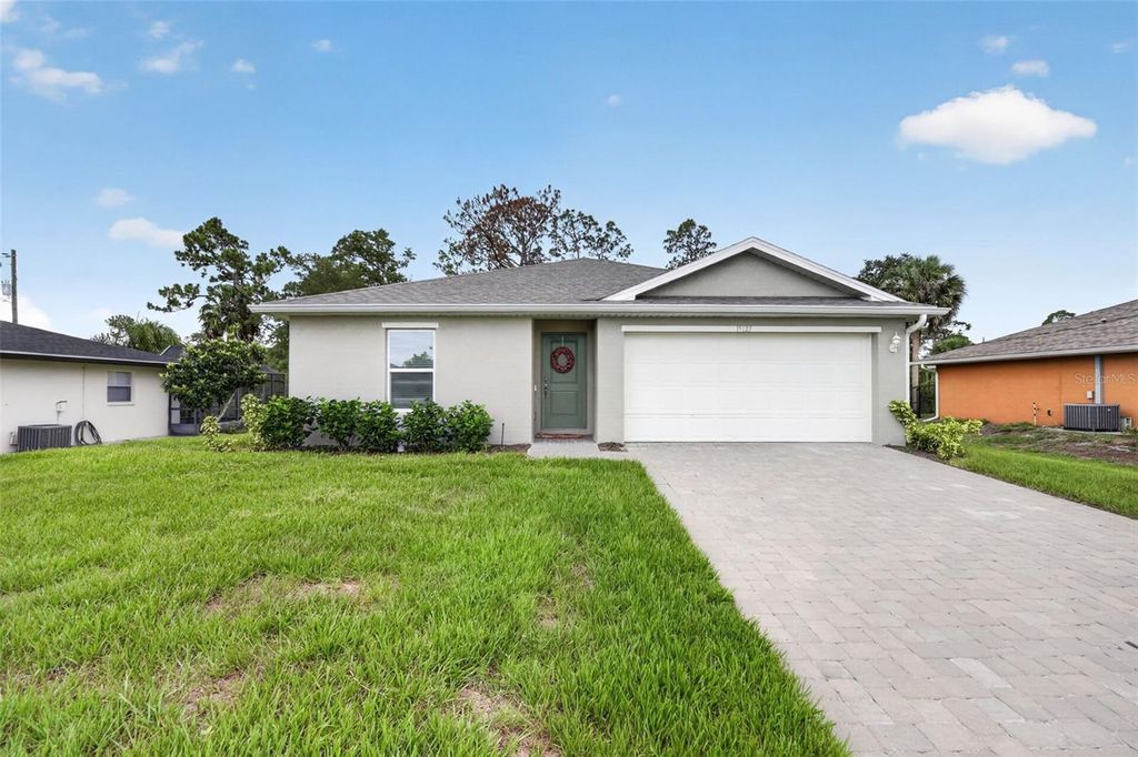 Photo of 15123 Buswell Avenue, Port Charlotte, FL 33953 (MLS # O6412967)