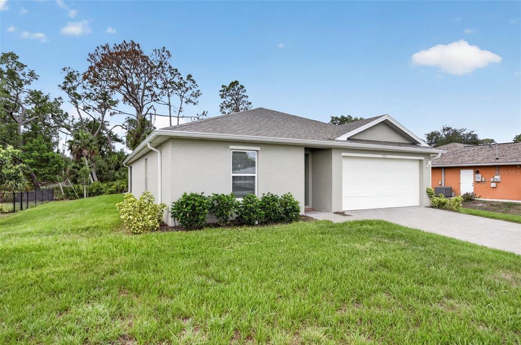 Photo of 15123 Buswell Avenue, Port Charlotte, FL 33953 (MLS # O6412967)
