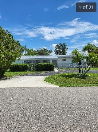 Welcome to 158 Concord Dr in beautiful Port Charlotte. This well maintained home in a quite neighborhood offers fantastic opportunity for first time home buyers. The perfect balance of comfort and affordability. Eat in kitchen area and counter with stools is perfect for morning meals. Kitchen has double sink and ample counter space for cooking or entertaining. Metal roof was installed in 2021. No HOA fees. A Florida room with enclosed windows and a lanai off one bedroom with sliding glass doors gives you a true Florida living experience. Large private fenced in yard with plenty of room for Gardening, relaxing or even potentially adding a pool. Covered carport and storage area outside the home. 
Location of this home is perfect for the use of Port Charlotte beach park where you can launch your boat, play pickleball or just have a relaxing walk. Close to Hospitals, Shopping, Dinning, and so much more.