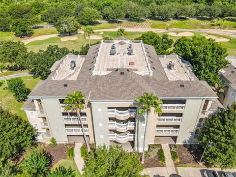Photo of 1358 Centre Court Ridge Drive #101, Reunion, FL 34747 (MLS # O6421990)