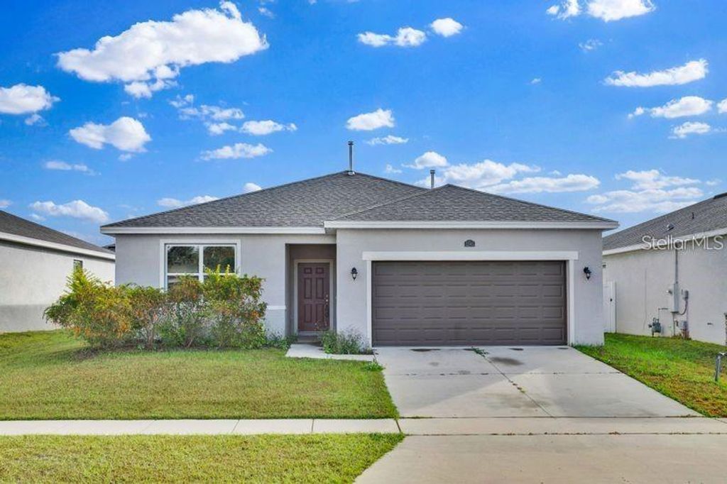 Photo of 3345 Curlew Avenue, Leesburg, FL 34748 (MLS # O6404699)