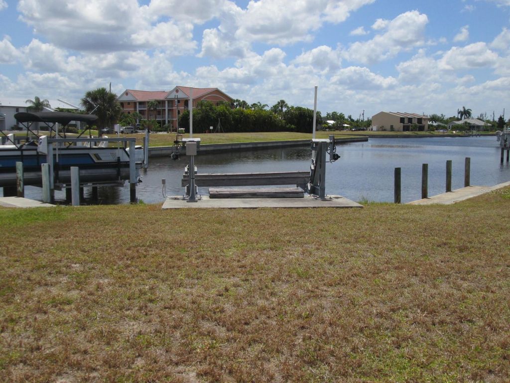 Photo of 825 Via Tripoli, Punta Gorda, FL 33950 (MLS # C7492108)