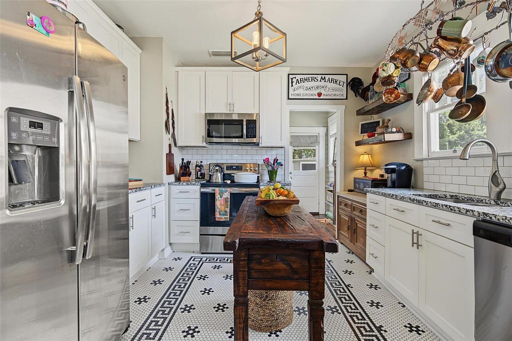 Photo of 809 E Flora Street, Tampa, FL 33604 (MLS # TB8554632)