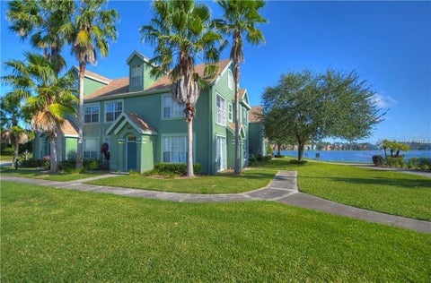Photo of 9414 Lake Chase Island Way #9414, Tampa, FL 33626 (MLS # TB8551340)