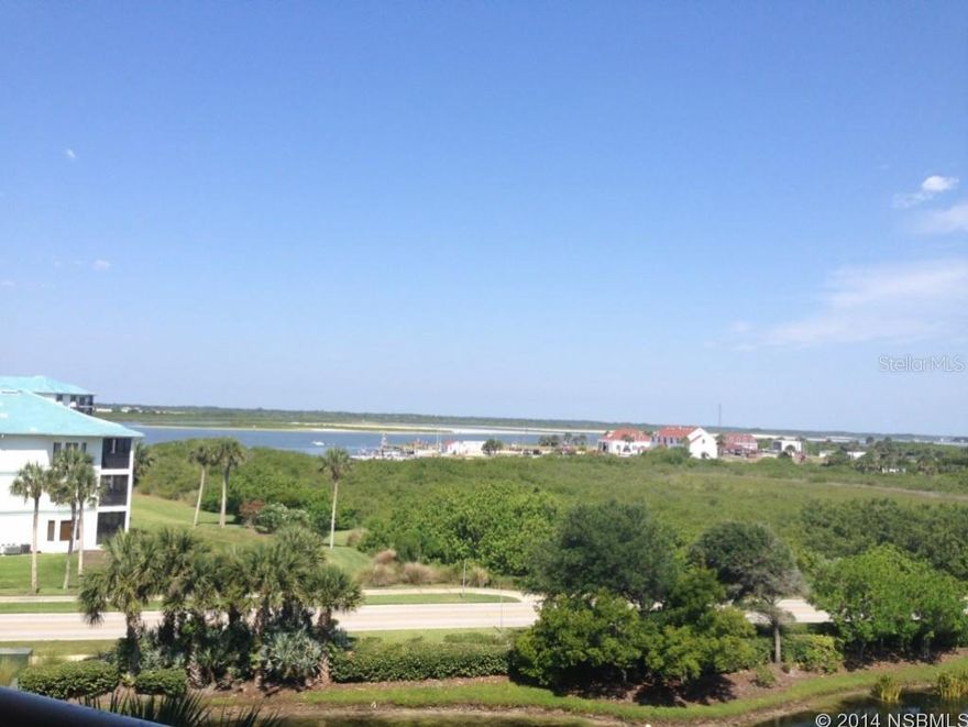 Spacious 2 bed 2 bath Minorca condo in the Evissa building with fabulous views of the light house and intracoastal water way, and the dunes.Newly furnished for comfort and relaxation.Step out onto the balcony and feel the breeze of the Atlantic Ocean and enjoy the views while grilling out. The kitchen opens up to the dining room and breakfast nook - a nice open floor plan to allow views form many areas. Large flat screen tv in living room and wifi.