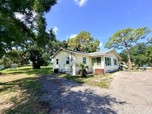 Photo of 420 53rd Avenue E, Bradenton, FL 34203 (MLS # A4698564)
