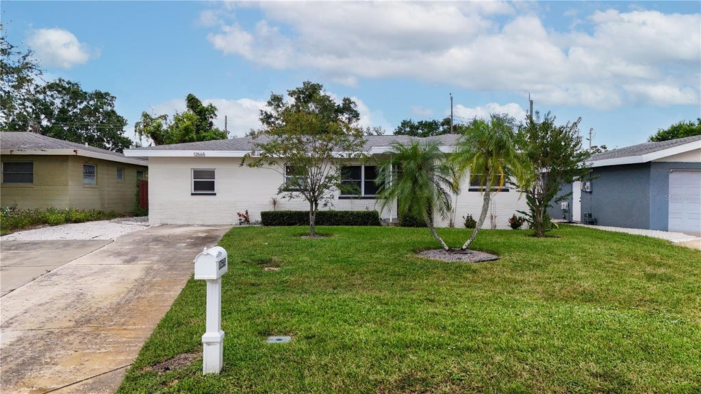 Photo of 12565 81st Avenue, Seminole, FL 33776 (MLS # TB8550029)