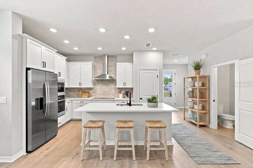 Photo of 5617 White Ibis Point, Saint Cloud, FL 34772 (MLS # TB8555929)