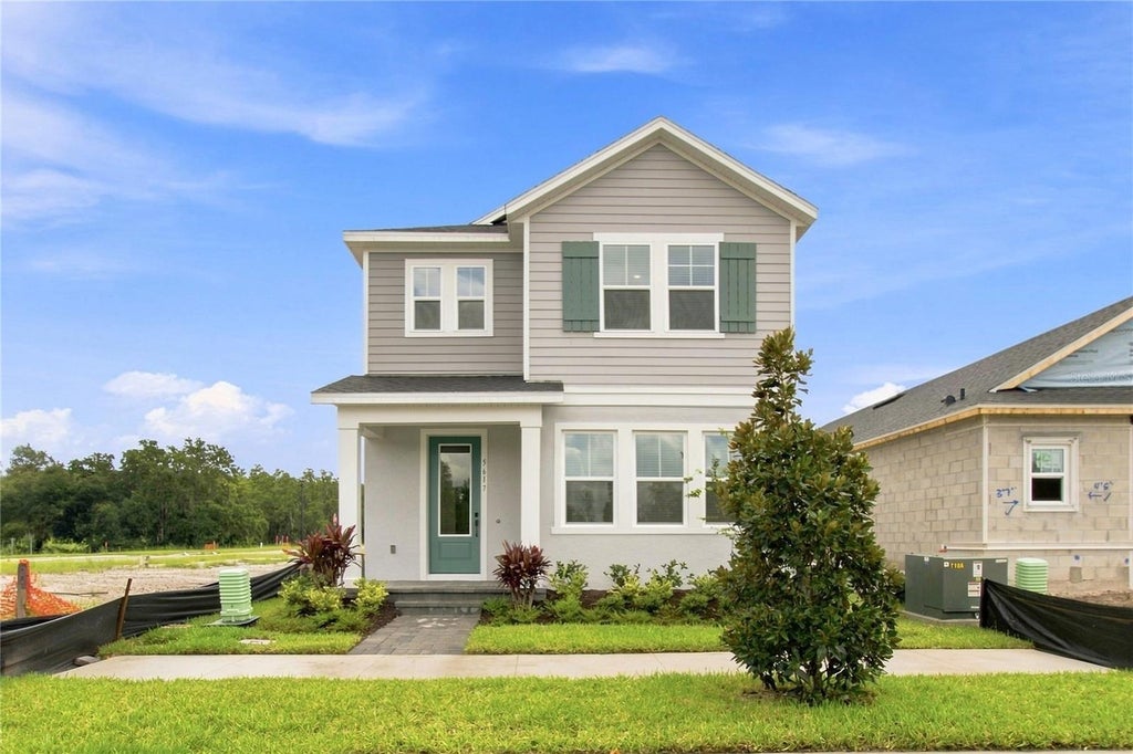 Photo of 5617 White Ibis Point, Saint Cloud, FL 34772 (MLS # TB8555929)