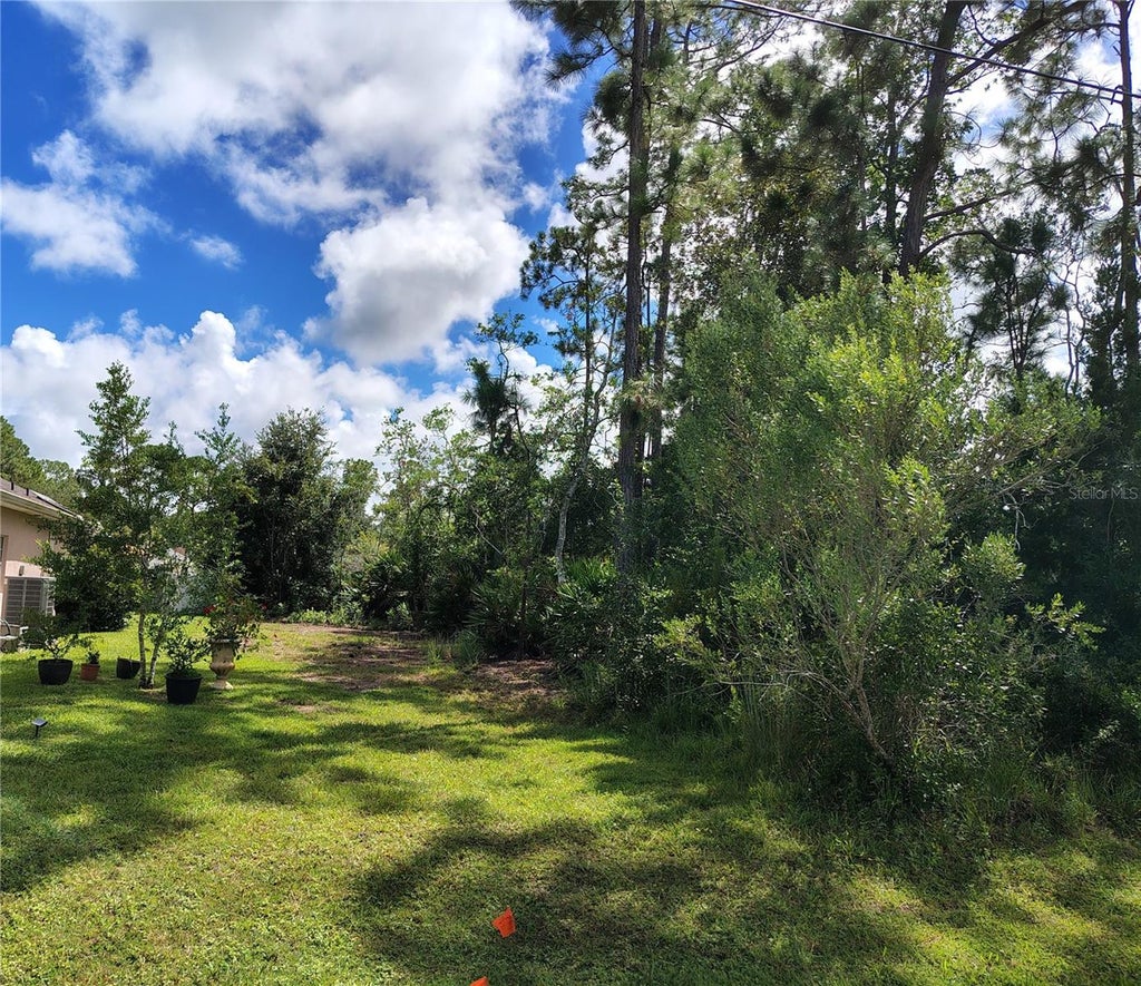 Photo of 8 Ryding Lane, Palm Coast, FL 32164 (MLS # FC321163)
