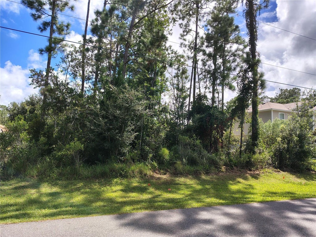 Photo of 8 Ryding Lane, Palm Coast, FL 32164 (MLS # FC321163)