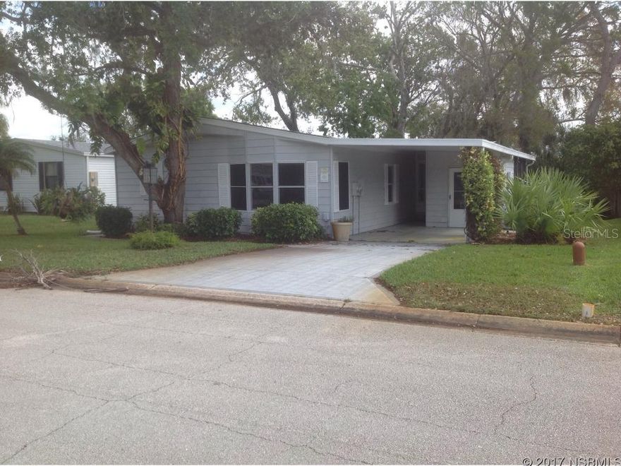 Come see me !!!   Air Conditioner new in 11/13 with a 5 year parts warranty.   Walls and ceilings newly painted in pleasing relaxing colors....Pergo flooring in living room, dining room and hallway and carpet in the Bedrooms.  Bead board in the Living Room..Dining Room opens to Living area and Kitchen.   Kitchen has new countertopsScreen room off the living room.  A very private backyard. Termite bonded.    Come see and enjoy all that Edgewater Landing has to offer you. ;Water: City