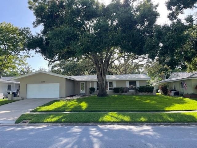 One Owner Home for 54 years. Fantastic Dunedin Location. Walk to Hammock Park. House backs to Park Very Private. Wonderful mature Oak Trees, Tile roof. Walk to Dunedin High School. Golf cart area. 3 Bedrooms, 2 Bathrooms and a 2-car garage. Information from Pinellas County Property Appraisers.