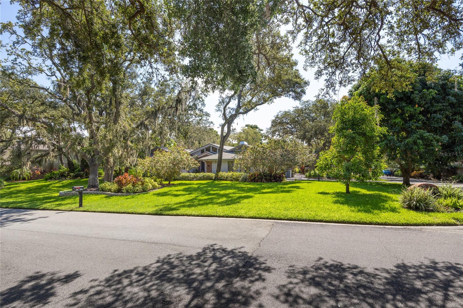 Welcome to your new home in one of Dunedin's premier neighborhoods. This spacious 4-bedroom, 3.5-bath property has everything you need to enjoy the Florida lifestyle. The house has stunning vaulted ceilings and a bright open layout of over 3,000 square feet of living space.
The kitchen is a standout with extensive counter space and storage, making it perfect for cooking and entertaining. The primary suite feels like a private retreat and the 3 additional bedrooms give you all the flexibility you need.
The tropical landscape with beautiful fruit trees is exceptional. A large in-ground pool and spa makes the yard perfect for relaxation.
This golf-cart friendly neighborhood is just blocks from Dunedin Country Club and Golf course and minutes from downtown Dunedin with great restaurants, shops, parks and a marina.
Honeymoon and Caladesi Island, two of the most beautiful beaches in Florida, are also just minutes away.
You will feel at home and the start of your Florida lifestyle the moment you walk in.