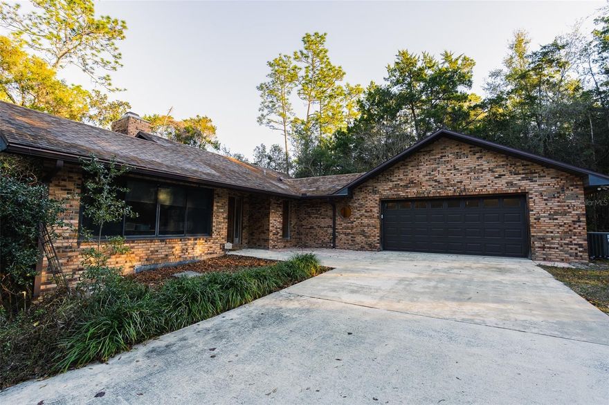 Secluded Mid-Century Modern Home on 2.08 Acres – Minutes from Downtown DeLand

Wake up to the sound of birds in this peaceful hillside retreat. This 2-bedroom, 2.5-bath home offers privacy, natural beauty, and timeless style. Built in 1985, the property showcases vaulted ceilings throughout the upstairs living area, large windows with tranquil wooded views, and multiple outdoor living spaces.

The main level features an open living room with a wood-burning fireplace,spacious dining area, vaulted ceilings, and access to a screened summer patio. A large Florida room under air provides year-round comfort and beautiful views of the surrounding trees and wildlife.

Bedrooms are located downstairs, each with an ensuite bath, walk-in closet, and sliding glass doors to a private patio.

Situated on 2.08 acres of agriculturally zoned land, this home includes a 24' X 40 workshop, storage shed, and oversized two-car garage with extra space for storage or hobbies.

Enjoy the feeling of being tucked away in nature while still being minutes from downtown DeLand, shopping, dining, and entertainment.

Features:

2 Bedrooms / 2.5 Baths
Built - 1985
Roof - 2007
HVAC - 2017
Well 4" installed 2007
Mid-century modern design
Vaulted ceilings and large windows
Wood-burning fireplace
Florida Room under air
Screened summer Porch.
Thermal Windows
Outside Shower
Downstairs bedroom with en suite with private patios
2.08 acres zoned agricultural
24' X 40' Block Workshop and storage shed
Oversized two-car garage
Convenient to downtown DeLand
This private hillside home offers a rare combination of tranquility and convenience. Schedule your private showing today! All Realtor information is presumed correct but not guaranteed. Buyer and Buyers Agent to verify all information.