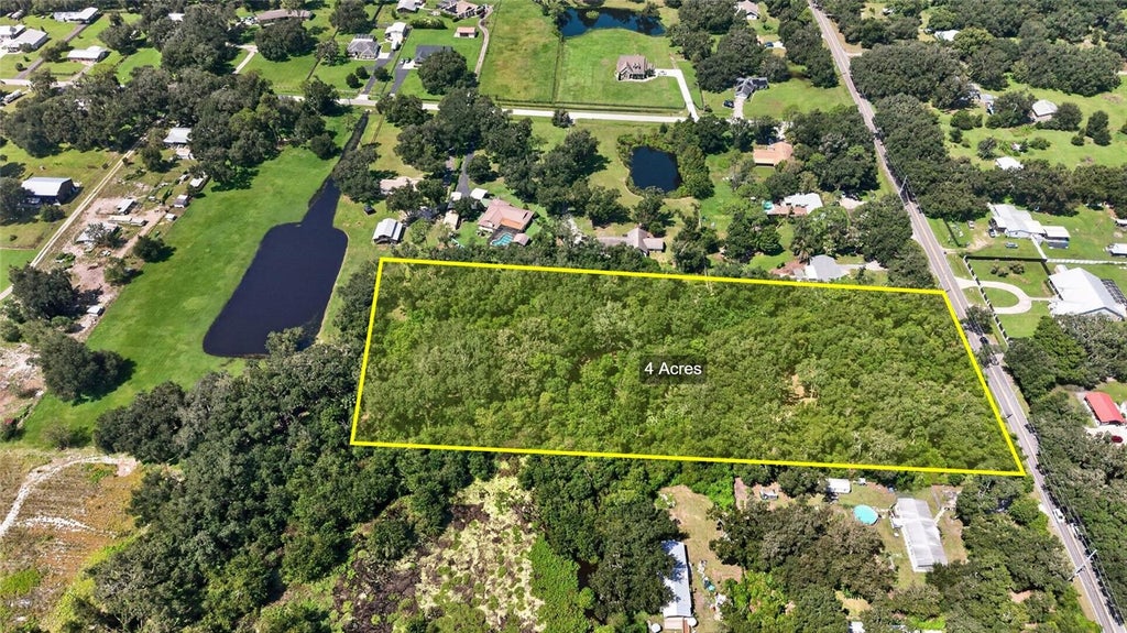 Photo of 00 W Knights Griffin Road, Plant City, FL 33565 (MLS # TB8548423)