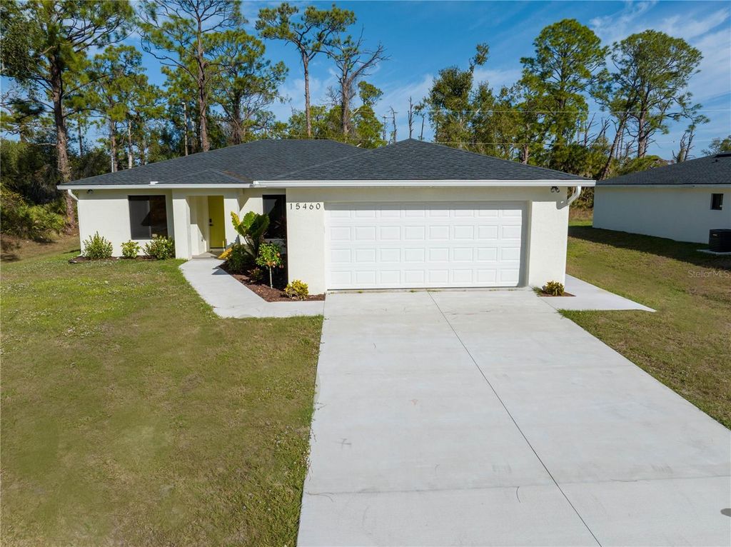 Photo of 15460 Chamberlain Boulevard, Port Charlotte, FL 33953 (MLS # C7519425)