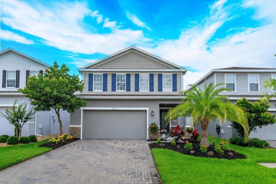 This meticulously maintained home shows like a model and is loaded with upgrades throughout. Perfectly positioned facing a conservation area and backing to serene pond views, this home offers both privacy and beauty in pristine, move-in-ready condition. Why wait to build when you can enjoy a home with so many thoughtful upgrades already in place?
From the moment you arrive, the exceptional curb appeal stands out — featuring lush, well-maintained landscaping, upgraded stone veneer accents, and a welcoming front porch. Inside, the home offers 4 bedrooms, 3 full bathrooms, and a versatile flex room currently used as an office, but easily suitable as a fifth bedroom with a full bath conveniently located downstairs — ideal for multigenerational living or guest accommodations.
The oversized foyer provides ample space for a bench or accent table, creating a warm and functional entryway. The chef’s kitchen is beautifully appointed with double ovens, tile backsplash, under-cabinet lighting, cabinet crown moulding, and a pantry featuring custom shelving. The spacious family room is filled with natural light, enhanced by additional side windows that create an open and airy feel.
Upstairs, you’ll find a cozy loft, convenient laundry room, and three additional bedrooms. The spacious primary suite features an elegant tray ceiling and dual walk-in closets with custom organization systems. Every bedroom in the home includes custom closet systems for maximum functionality and storage.
Step outside to the screened lanai, an ideal space for relaxing or entertaining, complete with durable epoxy flooring and tranquil views of the fenced backyard and pond. The homeowner has also added an outdoor kitchen rough-in, making it easy for future owners to design and install their dream summer kitchen. The garage is equally impressive, featuring commercial-grade epoxy flooring, built-in cabinets, and overhead storage.
Located in Lakewood Park, residents enjoy access to a community pool and playground. Nearby, DeLand offers a vibrant downtown filled with charming boutiques, local dining, and cultural attractions, while convenient access to major highways makes commuting to Daytona Beach, Orlando, and beyond effortless. This home will not disappoint. Make an appointment to view today. May be under audio/visual surveillance.