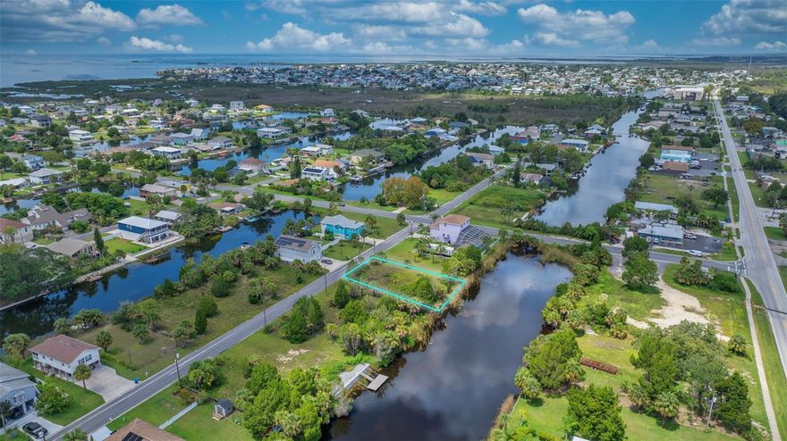 IMPACT FEES PAID!!! Utilities paid. Discover Your Slice of Paradise! This prime 50 x 100 (5000 SF) waterfront lot in the picturesque Hernando Beach is the perfect canvas for your dream home. Nestled within the tranquil Hernando Beach community, surrounded by the stunning Weeki Wachee Preserve, this property offers unparalleled natural beauty and a vibrant local lifestyle. Enjoy easy access to a variety of restaurants, live entertainment, and charming local shops. Just minutes away from the world-famous Weeki Wachee Springs and the serene Weeki Wachee River, your weekends can be filled with adventures like exploring the Hernando Beach Flats or taking a quick boat ride to destinations such as Anclote and Homosassa River. Key Features: No HOA Fees - Enjoy the freedom of ownership without additional costs, Short-Term Rentals Allowed - Ideal for investment opportunities or seasonal escapes, Utilities Ready - Water, sewer, and power connections are conveniently located at the street, R1B Zoning - Perfect for a single-family home, Impact Fees Paid - A step ahead in your building process. Please note: The property is located in a flood zone, requiring any new home to be elevated. Aerial lot lines are approximate. Seize this rare opportunity to build in a community rich in charm and natural beauty. Make Hernando Beach your new address!