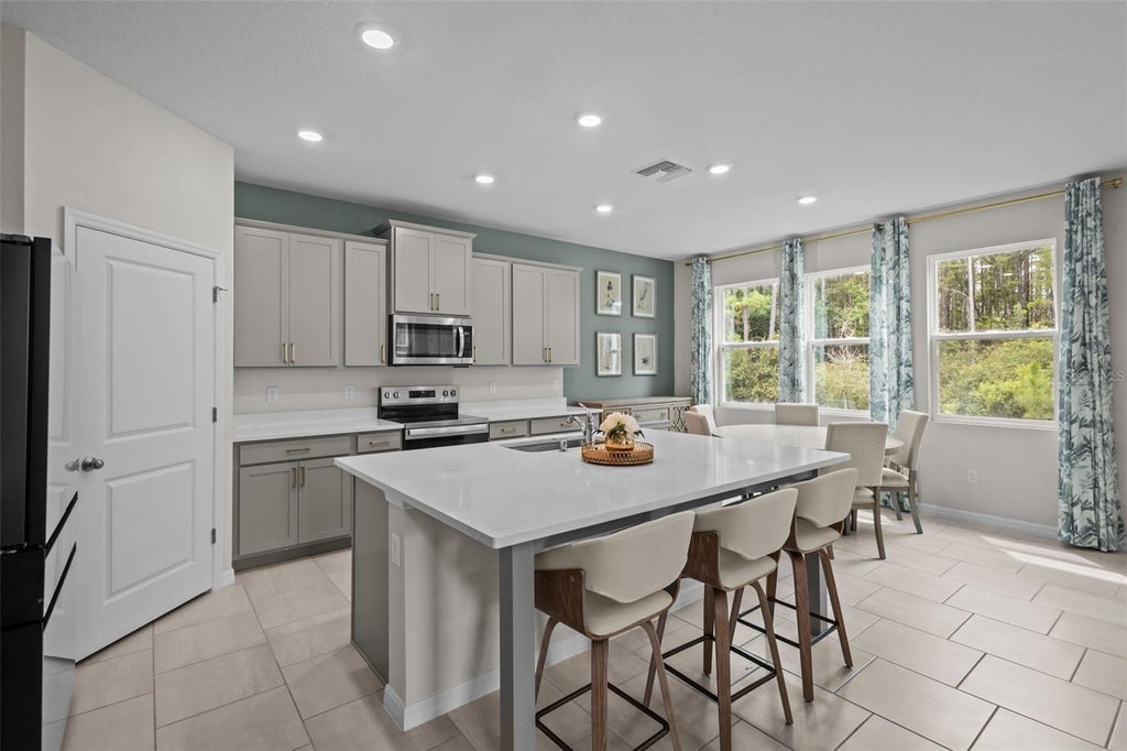 Photo of 6847 Daintree Court, Land O Lakes, FL 34638 (MLS # TB8550970)