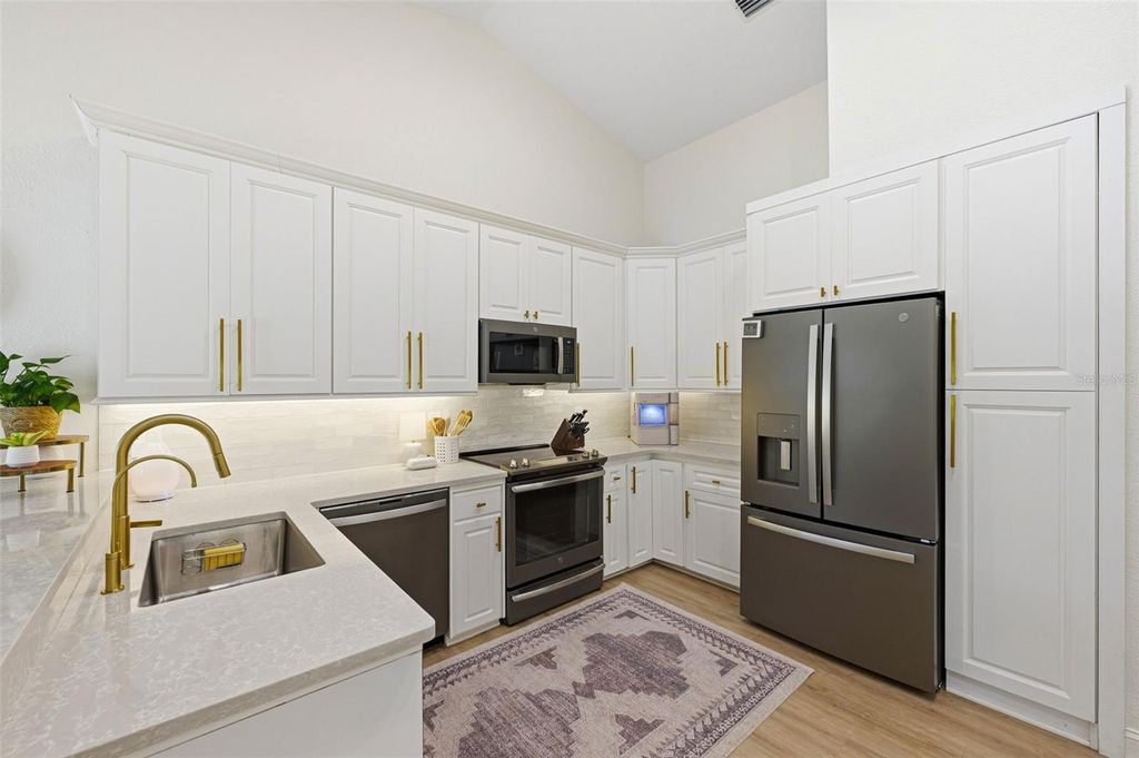 Photo of 3347 Lake Shore Lane, Clearwater, FL 33761 (MLS # TB8474201)