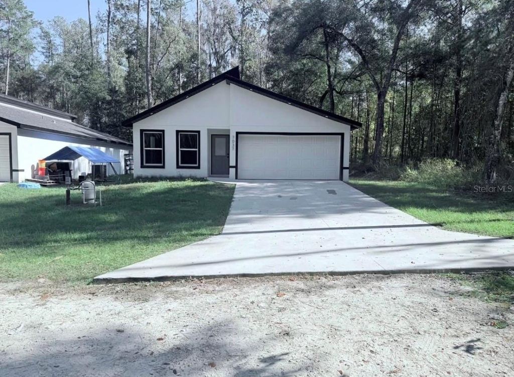 Photo of 7023 SE 23rd Avenue, Ocala, FL 34480 (MLS # OM722304)