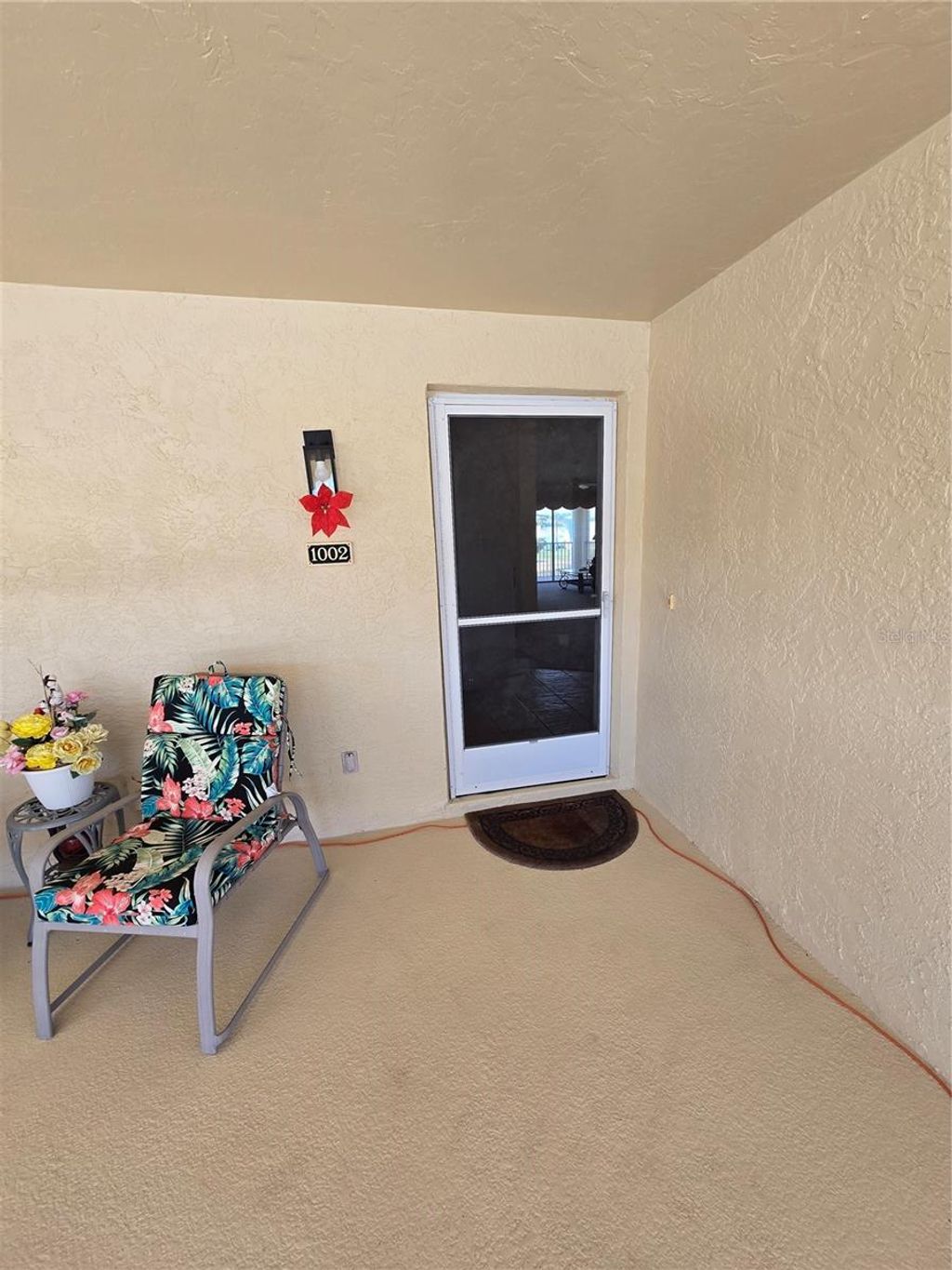 Photo of 5800 Sabal Trace Drive #1002, North Port, FL 34287 (MLS # C7518658)