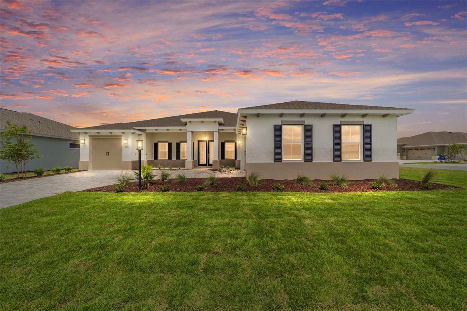 Experience the perfect blend of luxury, style, and flexibility in this brand-new Aberdeen model located on a corner lot in Balfour at On Top of the World. This stunning home features an open concept living space with tile flooring throughout and elegant tray ceilings. The gourmet kitchen is a chef’s dream with a large island, quartz countertops, tiled backsplash, under-cabinet lighting, staggered cabinets with crown molding, stainless steel appliances, and a walk-in pantry. Expansive 3-panel sliding doors in the living area lead to the screened lanai, creating seamless indoor-outdoor living. With 3 bedrooms and 3 bathrooms, including two master suites, this home is designed for comfort and versatility. The primary suite boasts a tray ceiling, five windows with blinds, a spacious walk-in closet, and a luxurious en suite with dual sinks and a zero-entry quartz-tiled shower with a built-in bench. Additional highlights include a versatile flex room with French doors and a split 3-car garage, providing ample space for work, hobbies, or guests. Located in the vibrant On Top of the World community, residents enjoy resort-style amenities and an active lifestyle — all in a brand-new, move-in-ready home. Call for your private showing today!
