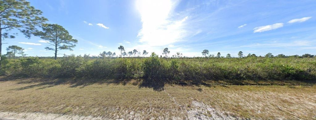 Photo of 501 Japonica Avenue, Indian Lake Estates, FL 33855 (MLS # O6354834)